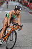 707810  Moniz aus Portugal, hbsche Portugisin  mit Rennrad in der Kurve, Radrennen bei Triathlon WM 2007 in Hamburg