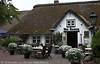 Restaurant Zum Kamin Kneipe in St.Peter-Ording Rettdachhaus Bild Nordsee Ferienort Urlaubsidylle