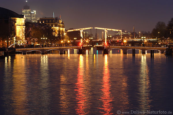 Amsterdam Brücken-Lichter Nacht Magere Brug über Amstel Wassergracht