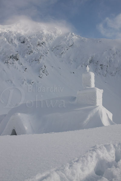 Ice-church in snow Fagaras mountains white-landscape at Blea Lake in Carpathian